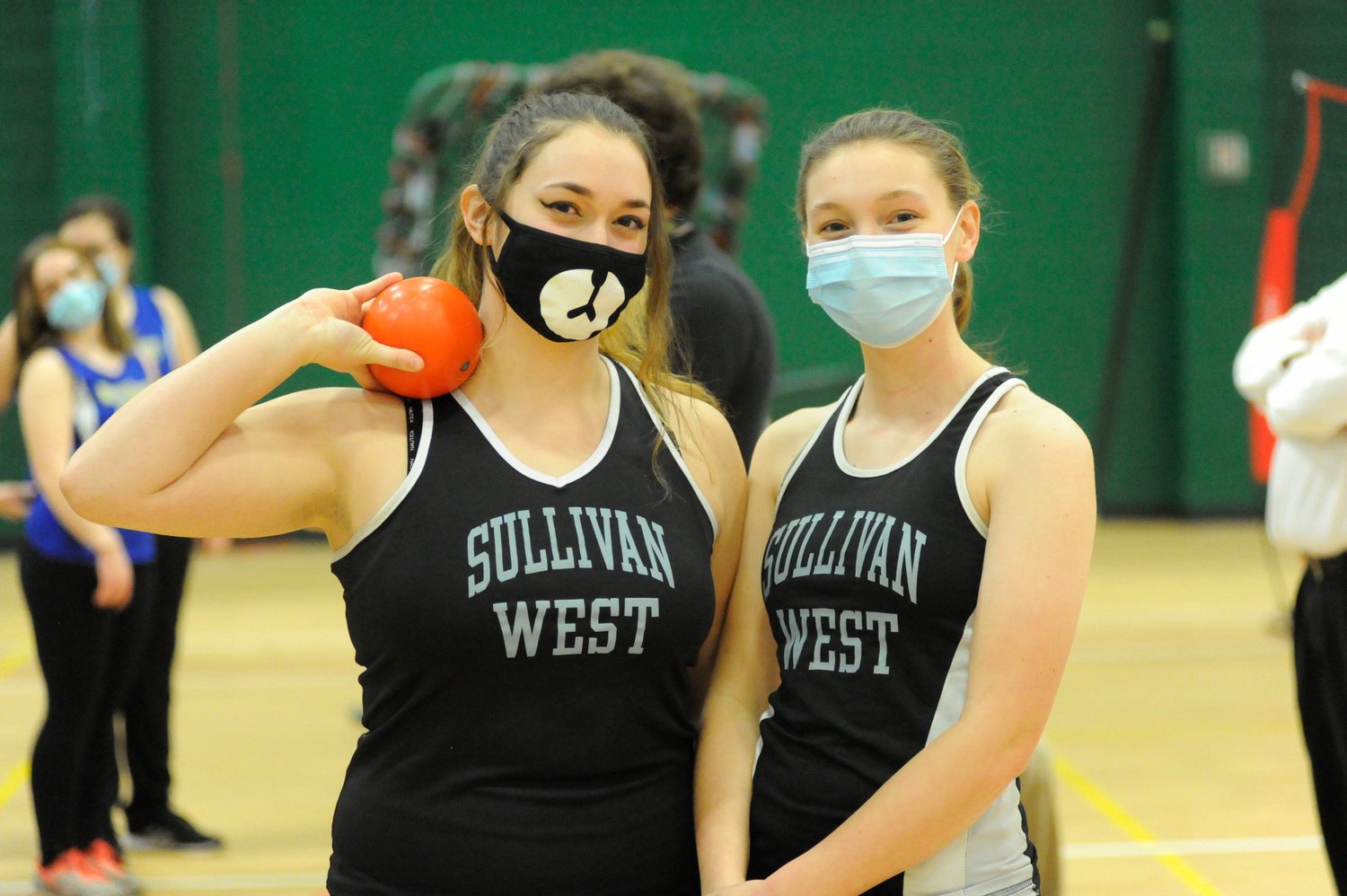 Sullivan West girls’ varsity shot-putters Kathryn Widman and Kaydence Everett. Widman placed first in the girls’ varsity event.